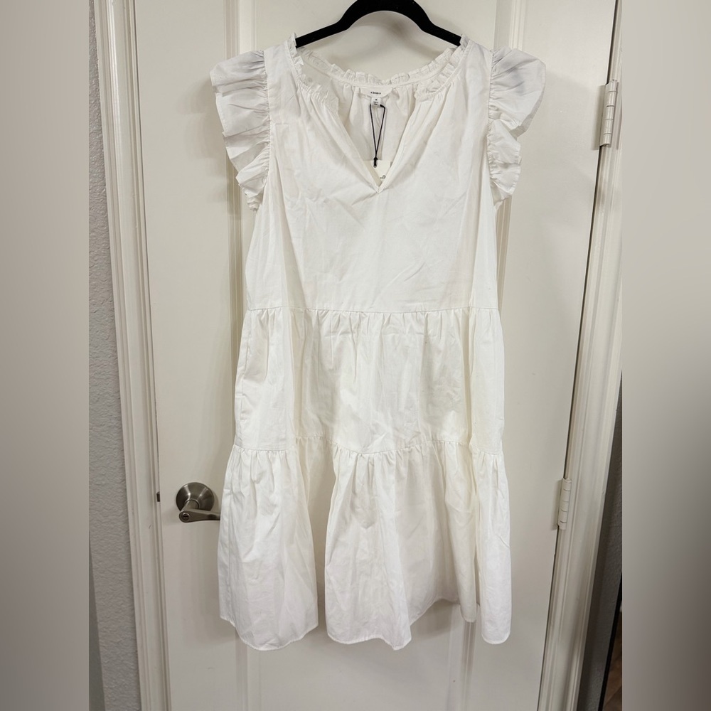 Elegant White Ruffle Sleeve Mini Dress